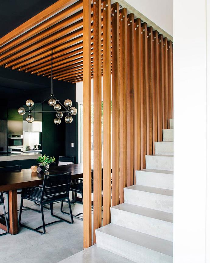 No more are the days of traditional timber ceilings. A timeless style with a modern twist, [this dining space](https://www.homestolove.com.au/renovated-open-plan-cottage-perth-residence-18914|target="_blank") ups the ante. Encased by timber planks that pave the ceiling to form a balustrade, it doubles as a both ceiling and a decorative design feature. 

*Photographer: Christopher Morrison | Story: Homes To Love*