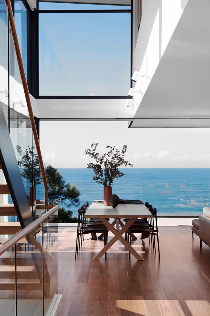 **Indoor-outdoor connection:** Double-height windows draw the sea and sunshine in to this home on Sydney's Northern Beaches, while a neutral palette - White, blackbutt floors and tonal furnishings - grants the vista top billing. <br> 
*Design by Studio Gorman; [studiogorman.com](https://studiogorman.com/|target="_blank"|rel="nofollow")*