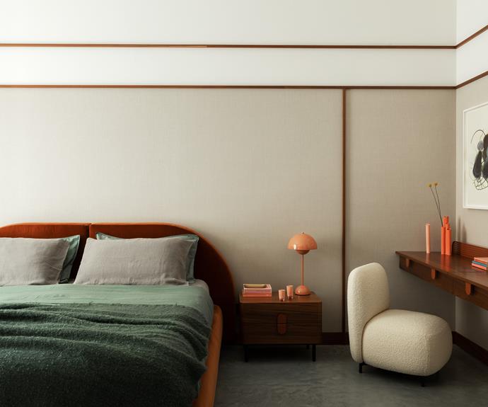 The combination of green and grey creates a calm atmosphere in the main bedroom, which features a Fabio-designed bedhead, bedside table and console. A Buddy armchair by [Pedrali](https://www.pedrali.com/en-us|target="_blank"|rel="nofollow") and Flowerpot lamp by Verner Panton for [&Tradition](https://www.andtradition.com/|target="_blank"|rel="nofollow") add a playful touch.