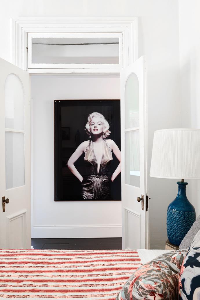 The narrow hallways have not been ignored: outside the guest bedroom hangs a portrait of Marilyn Monroe wearing a gold lamé dress designed by William Travilla in a studio portrait of the star to promote Gentlemen Prefer Blondes (1953).