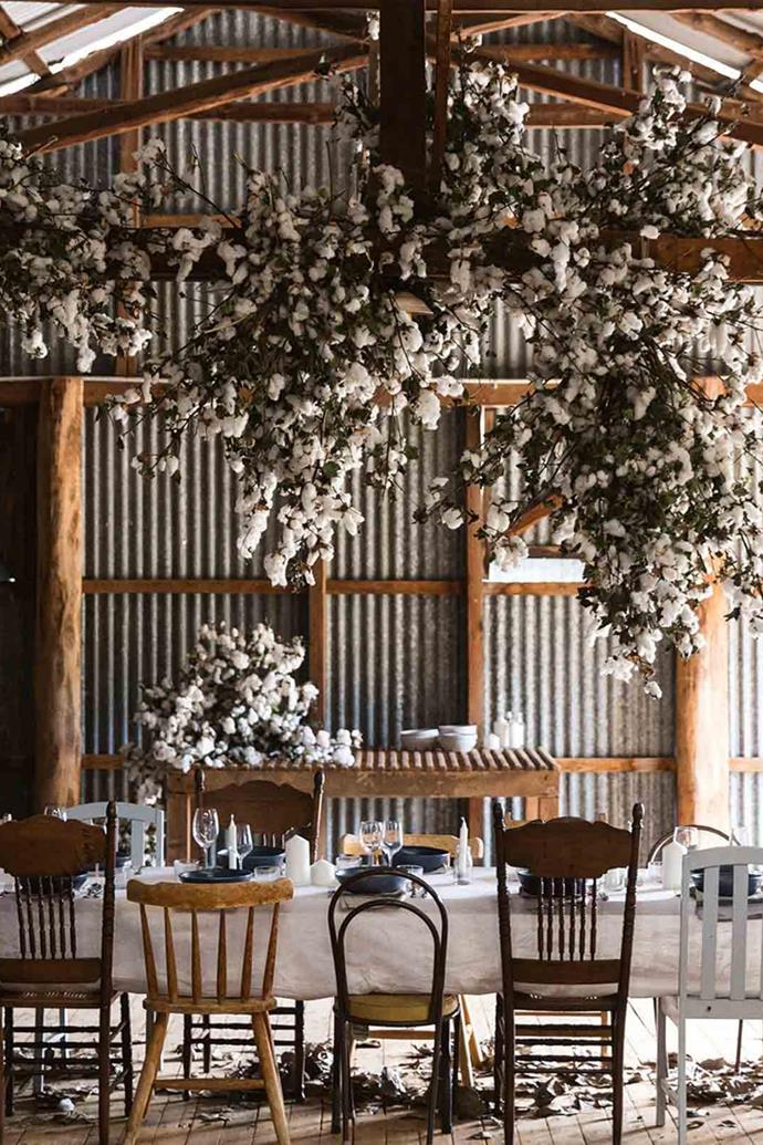 At [Moorabinda farmhouse](https://www.homestolove.com.au/farmhouse-christmas-13952|target="_blank"), a woolshed has been decorated with a cotton ceiling installation, fit for a "white Christmas". Mismatched chairs add to the charm and rustic atmosphere of the space. "We have Christmas dinner on Christmas Eve, which is oh-so-European and so much easier," says homeowner Julia Harpham, who always decorates the Christmas table with her mother's old embroidered white napkins.