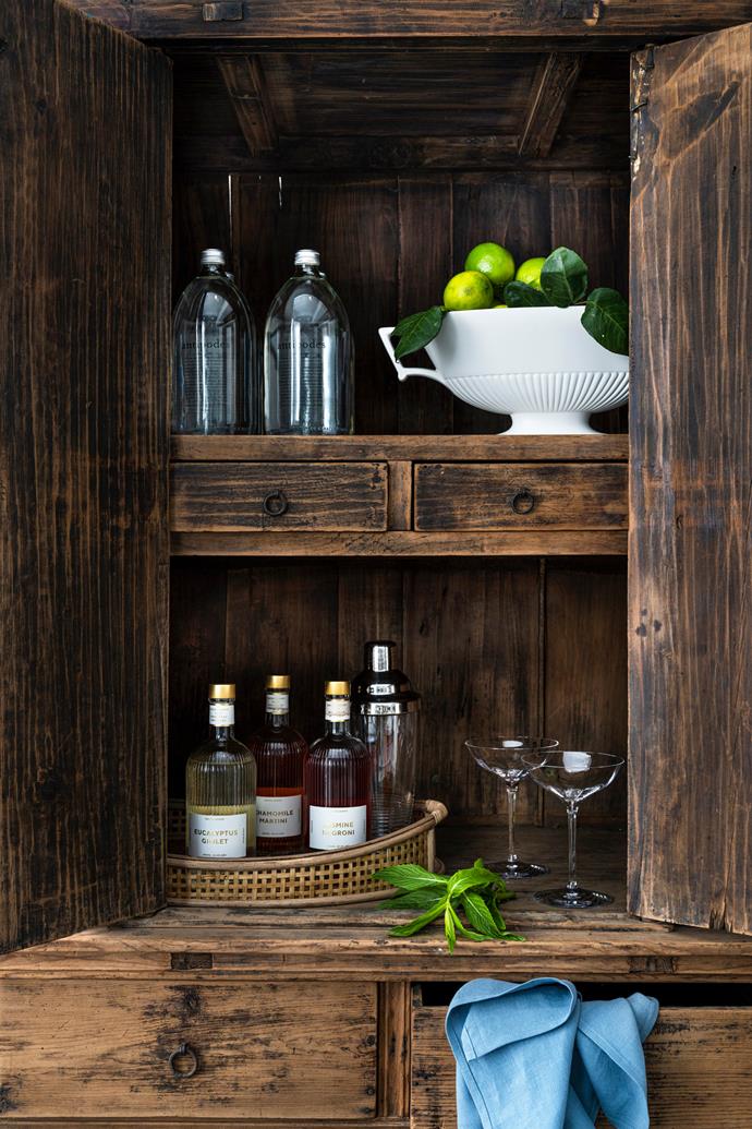 Antique two door cabinet, $2800, [Watertiger](https://watertiger.com.au/|target="_blank"|rel="nofollow"). On top shelf: Antipodes sparkling water, $27/pack of 6, Bellevue Hill Bottle Shop. Vintage Wedgwood rectangular 'Bateau' vase in Moonstone, $525, Becker Minty. On bottom shelf: Columbia rattan tray in Natural, $64.95, French Knot. Eucalyptus Gimlet, Chamomile Martini, and Jasmine Negroni bottled cocktails, all $69 each/500ml, Maybe Sammy. Mixology 'Circon' crystal cocktail shaker, $349, [Waterford](https://www.myer.com.au/b/Waterford|target="_blank"|rel="nofollow"). Elegance
Optic Champagne Belle Coupe glasses, $149/for 2, [Waterford](https://www.myer.com.au/b/Waterford|target="_blank"|rel="nofollow"). Linen napkin in Liberty, $59/set of 4, In The Sac.