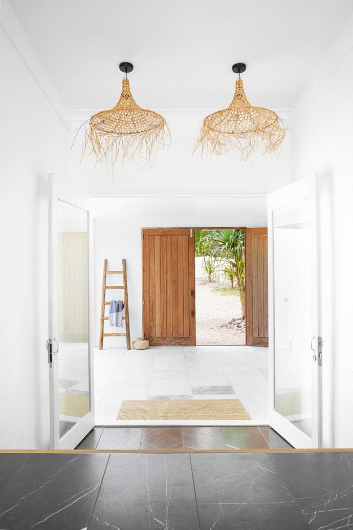**ENTRANCE** An extension incorporated a breezeway, which gives the home a Mediterranean-style double entrance at the front. The custom timber doors are by [WoodworkersXS.](https://www.woodworkersxs.com.au/|target="_blank"|rel="nofollow")