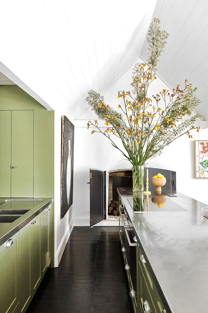 The owner of [one of Sydney's oldest homes](https://www.homestolove.com.au/sydney-oldest-home-ventnor-renovation-23259|target="_blank"), which is only accessible by water, chose the eucalyptus tone in the kitchen to evoke the feeling of being under the forest canopy.