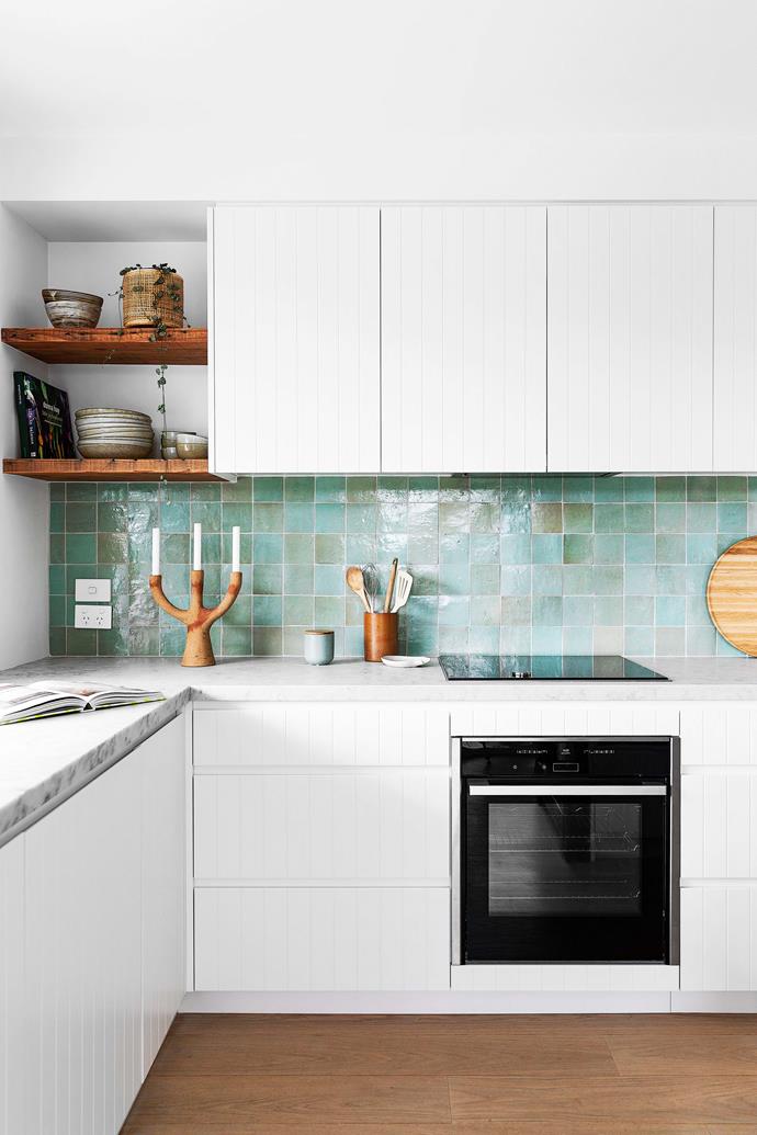 "Balance was the keyword," says interior designer Selena Mohr from Your Beautiful Home. "Amanda's love of white was pushed an extra step to include handmade Moroccan zellige tiles in green." The splashback in [this 1950s beach house](https://www.homestolove.com.au/northern-beaches-bush-beach-house-23149|target="_blank") is from Tiles by Kate.