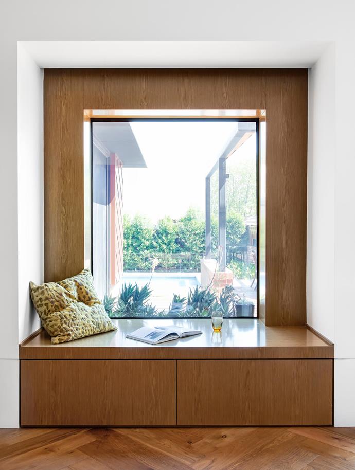 The stylish timber-framed window seat inviting the outside in to [this renovated Edwardian cottage](https://www.homestolove.com.au/edwardian-cottage-modern-restoration-19857|target="_blank") in Melbourne was inspired by the fond memories the owner had of growing up in the home. 