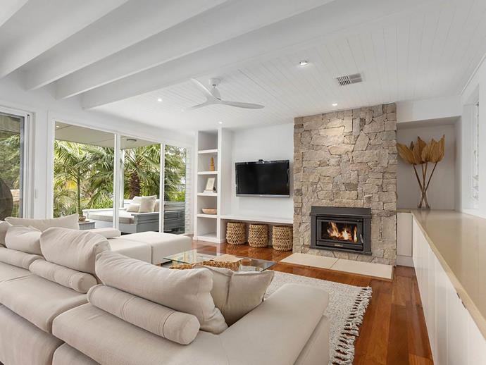 There's a wood fire heater for the cooler months and reverse-cycle air conditioning and ceiling fans for when its hot. *Photo: [domain.com.au](https://www.domain.com.au/97-green-point-drive-green-point-nsw-2428-2017481366|target="_blank"|rel="nofollow")*