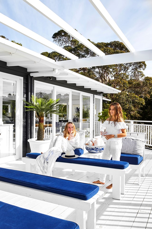 Even a simple white structure extends the living space, visually linking indoors and out - such as with this newly added pergola over the deck of [this Whale Beach holiday home](https://www.homestolove.com.au/bungalow-55-founder-whale-beach-house-23308|target="_blank").