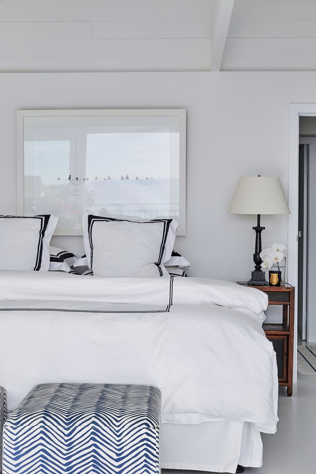 Crisp white with the luxury of nautical stripe detailing features in the bedlinen of [this Whale Beach holiday retreat](https://www.homestolove.com.au/bungalow-55-founder-whale-beach-house-23308|target="_blank"). 