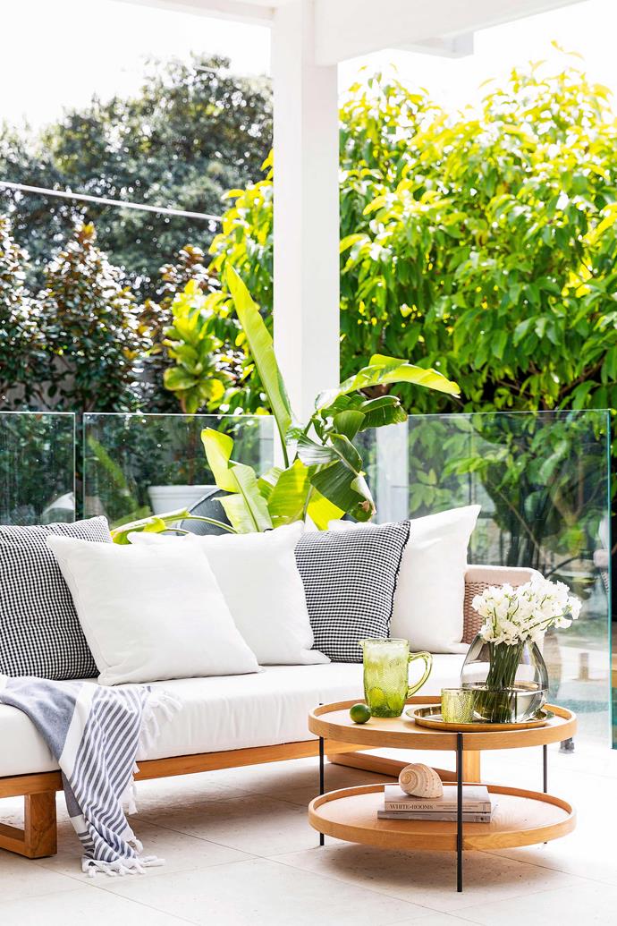 Guests are drawn outside, where the furniture is often rotated between the poolside and the courtyard. "These areas give us the flexiility we like," says Lou. By-the-water lounging is delivered by the 'Norfolk' sofa from [Smithmade](https://www.smithmade.com.au/collections/sofas|target="_blank"|rel="nofollow") and a coffee table from Globe West.