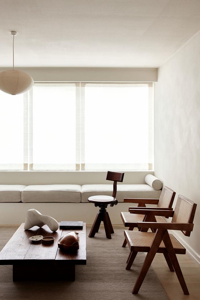 Melbourne designer Emily Gillis converted her [compact 1970s apartment](https://www.homestolove.com.au/neutral-apartment-emily-gillis-23316|target="_blank") into an elegant and minimal living space, including this custom banquette seating built by Stevens Waters under the window features a cosy reading nook and hidden storage.