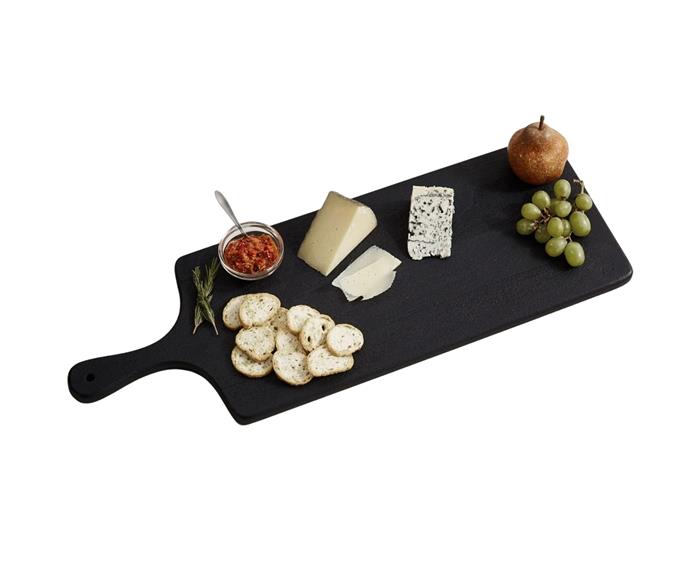 **[Chateau Acacia Wooden Cheese Board, from $75.20, Pottery Barn](https://www.potterybarn.com.au/chateau-wood-cheese-boards|target="_blank"|rel="nofollow")**<br>
With its stone-like appearance but solid acacia build, this minimalist cheese board has the best of both worlds. Elongated and curvaceous, this platter's form is simply crying out for an array of rich cheeses and fruits.