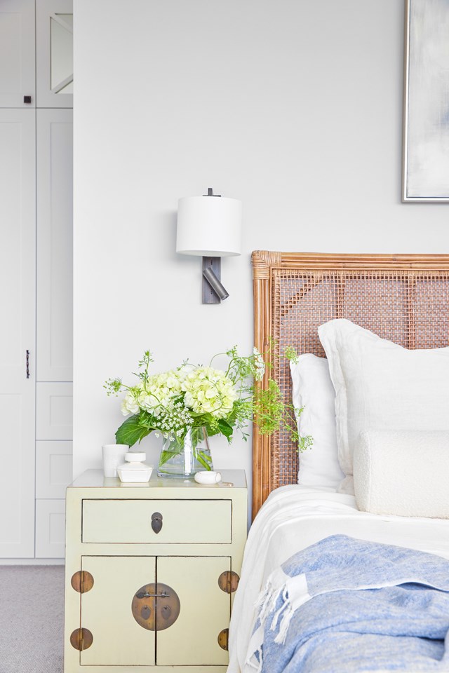 A touch of texture in the rattan bedhead of [this Hamptons main bedroom](https://www.homestolove.com.au/sydney-interior-designer-home-coastal-style-23326|target="_blank").