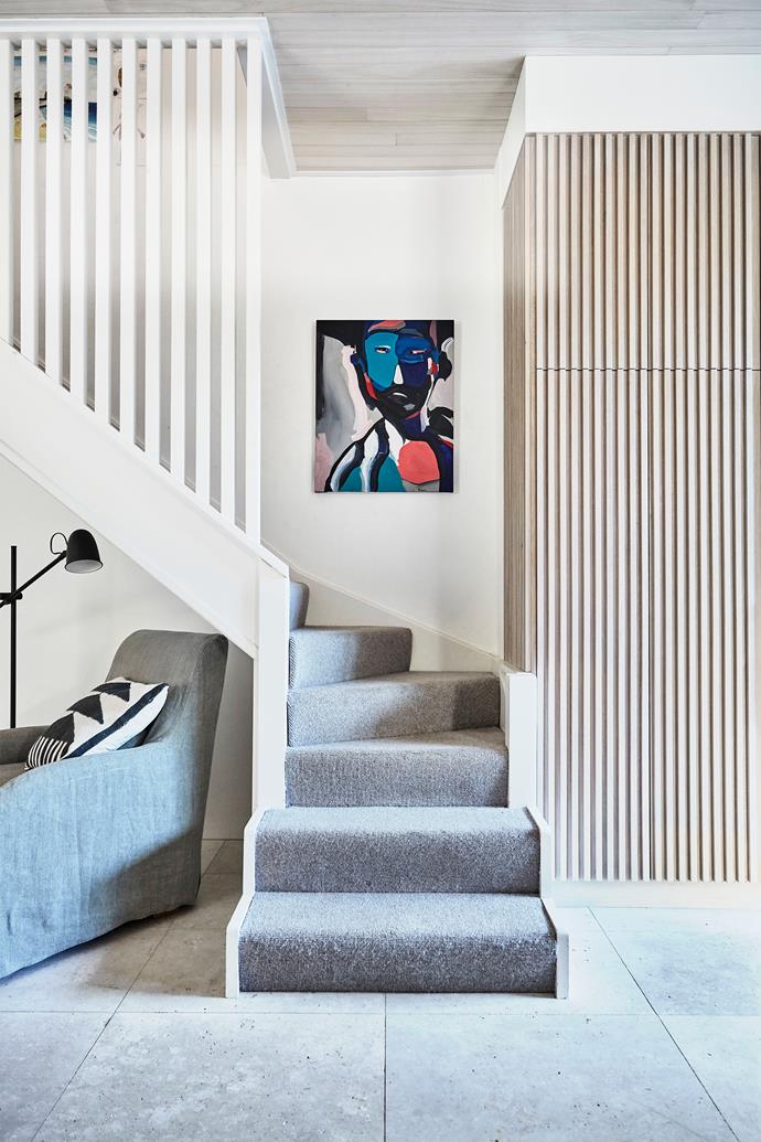 The carpet on your stairs can always benefit from some care. In the spotless stairwell of interior designer Kristy McGregor's Sydney home, a Nunzio Miano artwork presides.
