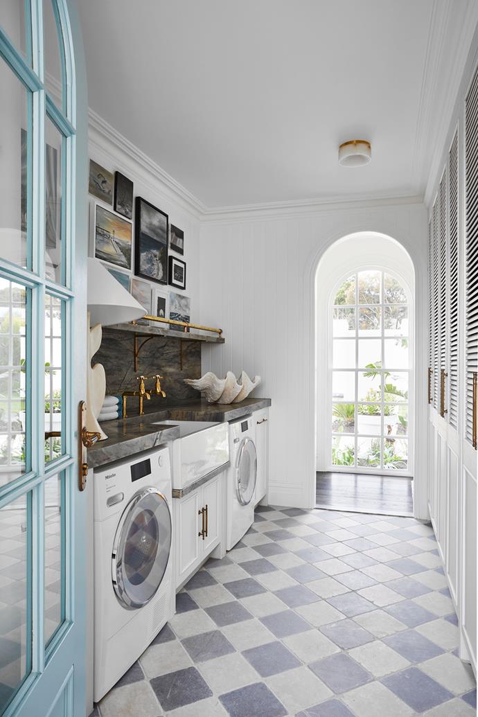 "Laundries are really important spaces. I think a laundry should be given as much credential as a kitchen,"says Kate. Tumbled marble tiles laid in chequerboard pattern (flooring) and Copacabana quartzite (benchtop and splashback) both from KWD & Co.