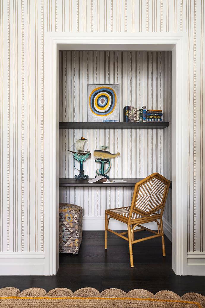 One of the kids' rooms is complete with a stylish study nook, decorated with Higgledy Piggledy Stripe wallpaper in Taupe by Anna Spiro.