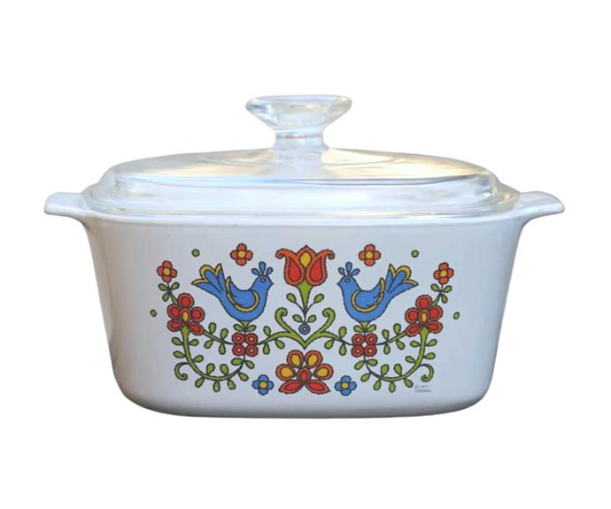 A 1975 CorningWare casserole dish featuring the Country Festival pattern, available to [buy on Etsy](https://www.etsy.com/au/listing/1130491267/1975-corning-ware-country-festival-3|target="_blank"|rel="nofollow").