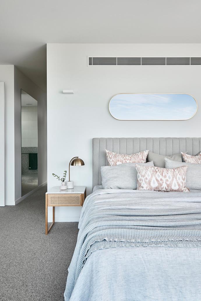 The palette is inspired by the elements. Linen, [Bed Threads](https://bedthreads.com.au/|target="_blank"|rel="nofollow"). Throw, [L&M Home](https://www.lmhome.com.au/|target="_blank"|rel="nofollow"). Avalon bedside table, [Life Interiors](https://lifeinteriors.com.au/|target="_blank"|rel="nofollow"). Desivy lamp and Halo mirror, [Temple & Webster](https://www.templeandwebster.com.au/|target="_blank"|rel="nofollow").