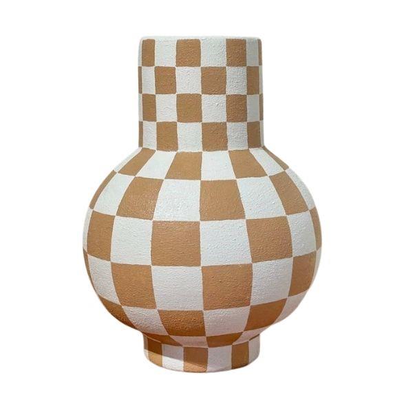 **[Handpainted checkered belly vase, $50, Etsy](https://www.etsy.com/au/listing/1143354606/handpainted-checkered-belly-vase|target="_blank"|rel="nofollow")**<br>
Etsy has hundreds of hand-painted, hand-crafted ceramics that feature a check pattern. We love this round belly vase that looks just as good as a sculptural piece as it would full of florals. This seller also has checked plant pots and decorative saucers available. **[SHOP NOW.](https://www.etsy.com/au/listing/1143354606/handpainted-checkered-belly-vase|target="_blank"|rel="nofollow")**