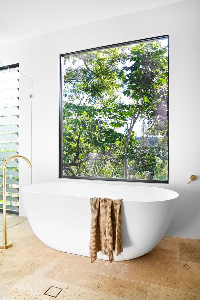 In the ensuite, a freestanding bath from Bunnings provides a tranquil spot.