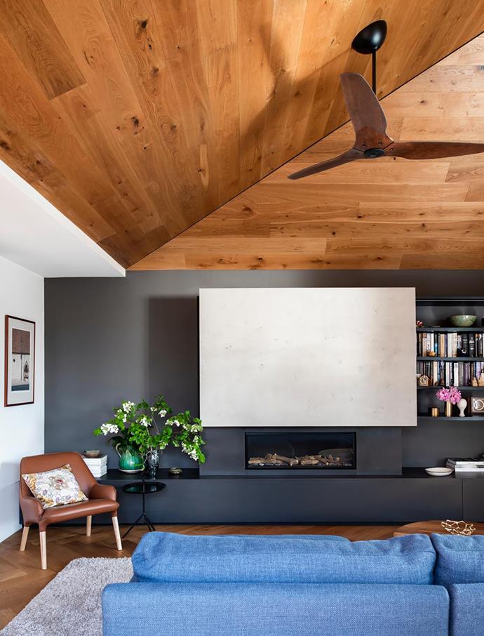 Keep your TV space as uncluttered as possible to ensure the screen remains the room's visual priority. In this [Edwardian home](https://www.homestolove.com.au/edwardian-cottage-modern-restoration-19857|target="_blank"), a slab of raw grey concrete keeps the TV hidden from view when not in use.