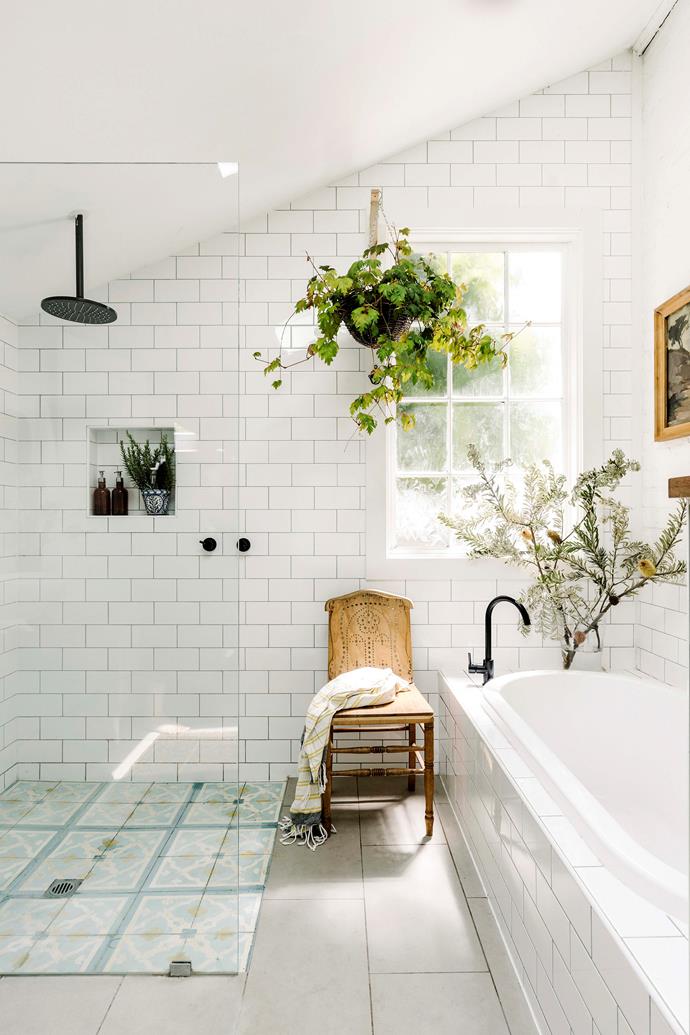 The shower in [this creative family cottage](https://www.homestolove.com.au/creative-family-cottage-with-vintage-furniture-23004|target="_blank") filled with vintage wares features a small niche that is the perfect place for shampoo, conditioner and a cute pot plant. 
