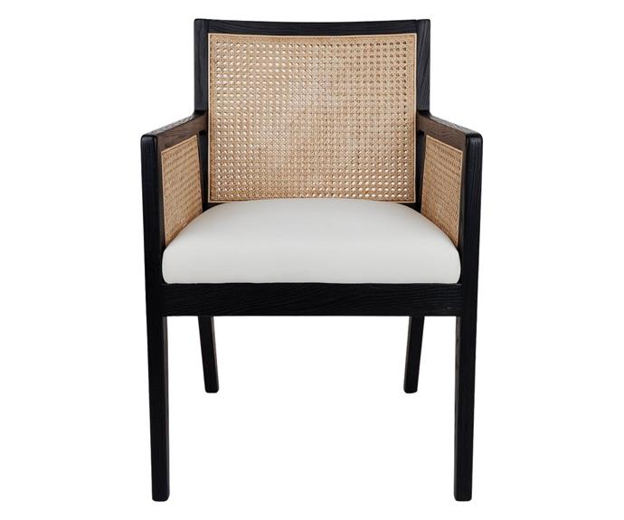 **[KANE BLACK RATTAN CARVER CHAIR, $1,195, INTERIOR ATTRACTIONS](https://interiorattractions.com.au/product/kane-black-rattan-carver-chair-white-linen/|target="_blank"|rel="nofollow")**

If classic, French provincial style get your heart beating, the Pierre Rattan armchair is the elegant chair for you. With plenty of cushioning and padding, it'll bring a touch of class and comfort to your home, while still nailing the rattan trend. **[SHOP NOW.](https://interiorattractions.com.au/product/kane-black-rattan-carver-chair-white-linen/|target="_blank"|rel="nofollow")** 