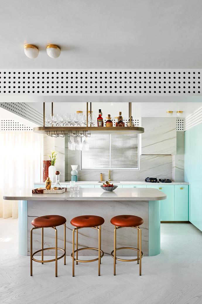 **CEILING SUSPENDED SHELVING**<br>
This bar, which hangs over the island bench of this uber-cool, energised kitchen is a drawcard for both the owners and their friends and has led to many gatherings in this ['70s Bondi Beach apartment](https://www.homestolove.com.au/playful-bondi-beach-apartment-23382|target="_blank"), transformed by Greg Natale.