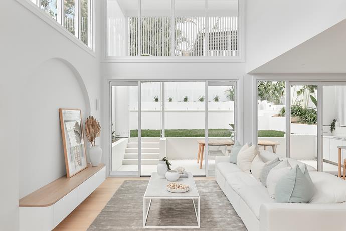 Window finishes are purposefully absent, as the strategic window placement and exterior screening do the heavy lifting. "The palette inside really accentuates and makes the most of that natural light coming in," says David.