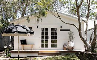 white shack in back garden