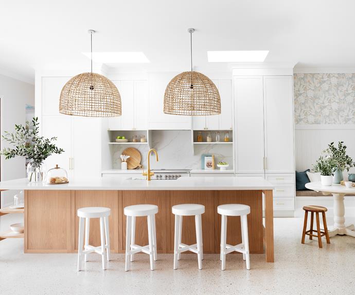 **KITCHEN** Minimalist benchtop accessories including an 'Isabella' fruit bowl from Isabel World as well as [House of Isabella](https://www.houseofisabella.com.au/collections/bar-stools|target="_blank"|rel="nofollow") bar stools and pendant lights from Uniqwa introduce a relaxed coastal feel. 