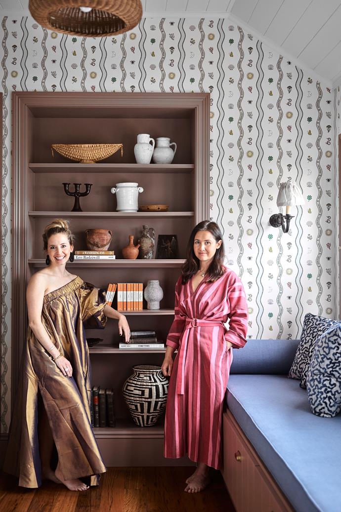 Designers Shannon and Dominique in the guesthouse library nook. On shelves, vessels from Water Tiger and Orient House, 'Greek Key' basket from Mercer & Lewis and vintage items. Banquette and bolster in 'Lexus Cornflower' from Warwick with cushions in Schumacher 'Janis' velvet. [Walls papered](https://www.homestolove.com.au/wallpaper-design-ideas-to-inspire-6635|target="_blank") in 'Climbing Curios' by artist Fee Greening for Common Room.