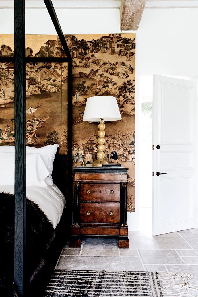 In the master bedroom of [this stately French-inspired country home](https://www.homestolove.com.au/wollumbi-estate-southern-highlands-nsw-23339|target="_blank"), a 'Machinto' four-poster bed is set against a backdrop of a pair of 18th-century Chinese-style mounted canvas screens. French antiques and luxurious finishes underpin the entire home, as profiled in Melissa Penfold's new book, Living Well by Design.