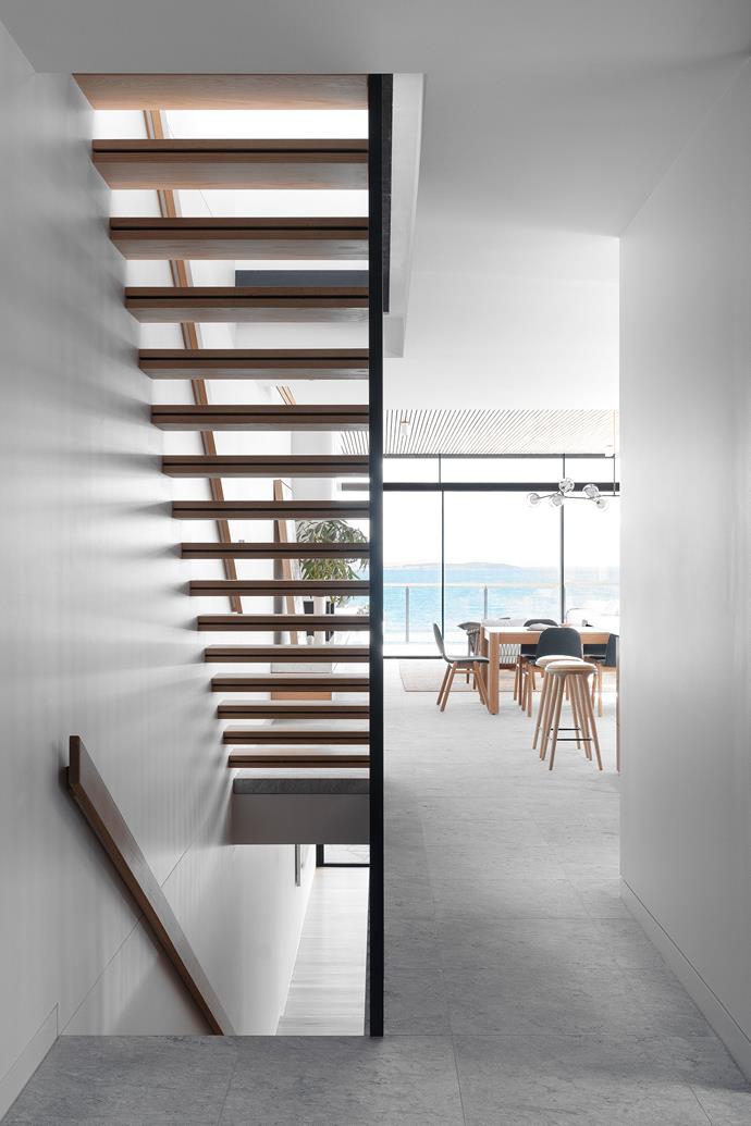 The American oak staircase has been designed so you can see right through to the view.