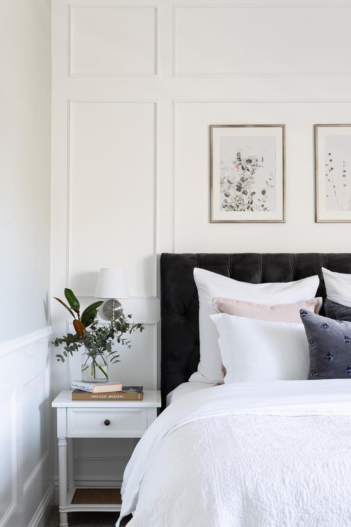 **MAIN BEDROOM** Laura's "soft, clean and simple" scheme is a serene mix of blush, white and grey with wafts of green – as seen in the Etsy prints she retouched by hand and the Dulux Spanish Olive gracing the walls. A velvet headboard from [Brosa](https://www.brosa.com.au/|target="_blank"|rel="nofollow") grounds the space, while a John Lewis bedside lamp and Temple & Webster table complete the classic look. The white linen pillows are from Sheridan and the grey velvet cushion is from Madras Link.