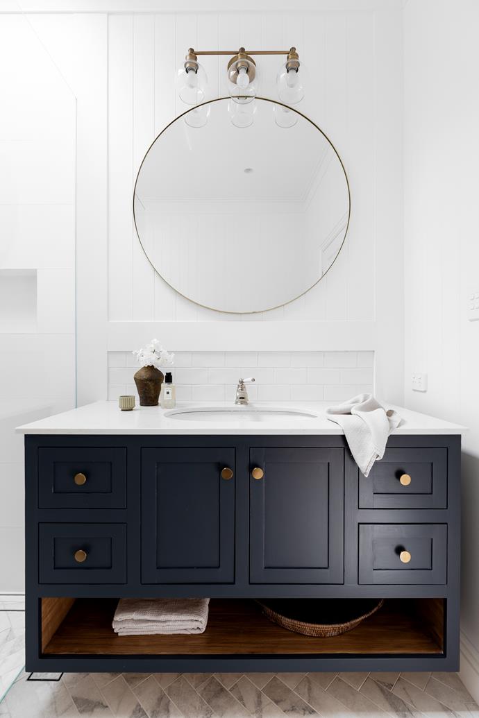 The boys' shower room has a classic Shaker-style vanity by Mark Howard.