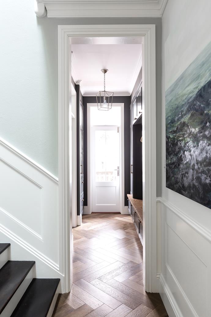 A painting by Laura hangs outside the mudroom. De Marque oak parquetry from [Preference Floors](https://www.preferencefloors.com.au/de-marque-collection-oak-wide-planks-and-parquetry/|target="_blank"|rel="nofollow").