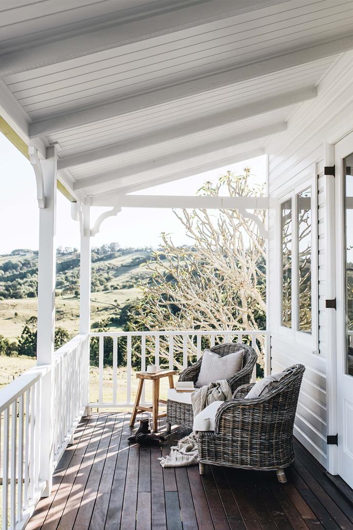This Byron hinterland home, [Glenfernie Farm](https://www.homestolove.com.au/glenfernie-farm-white-weatherboard-cottage-byron-23418|target="_blank"), is fitted with a verandah that overlooks the stunning rolling hills beyond, the perfect spot for a morning cuppa while watching the sunrise over Lennox Head.