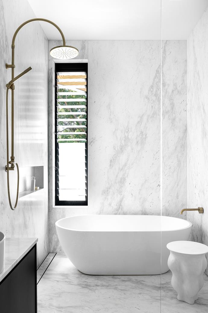 Freestanding bath, Stone Baths. Hermes Vangeli marble from Euro Natural Stone. Halo tapware and Yokato shower set, both Brodware.