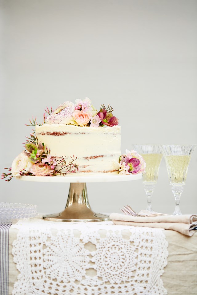A wider cake stand allows for the addition of a flourish of fresh flowers, as seen with our fan favourite [Passionfruit Naked Cake](https://www.homestolove.com.au/passionfruit-naked-cake-22569|target="_blank").