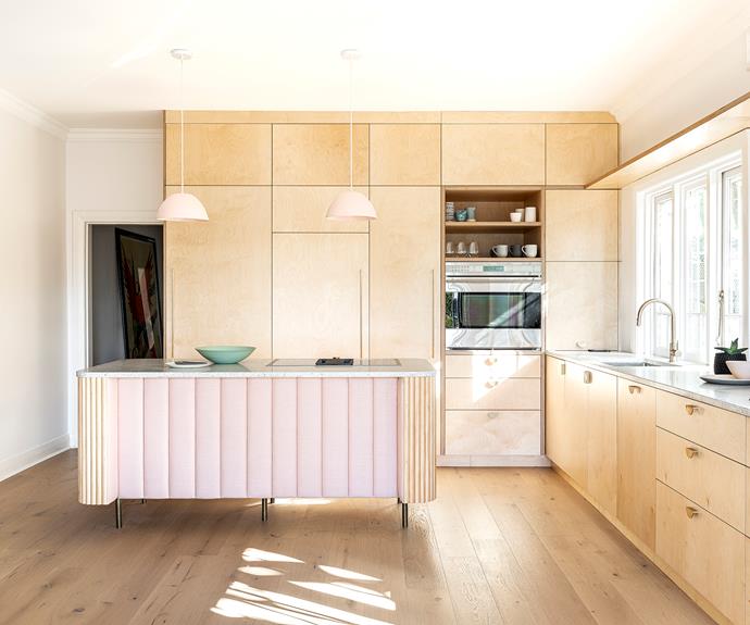 To gain space for the bathroom, the washing machine is integrated into the far-left panel of the kitchen. On the benchtop is a Mud 'Nest' bowl in pistachio. The long handles are Slimline 02 from [MadeMeasure](https://www.mademeasure.com/|target="_blank"|rel="nofollow").