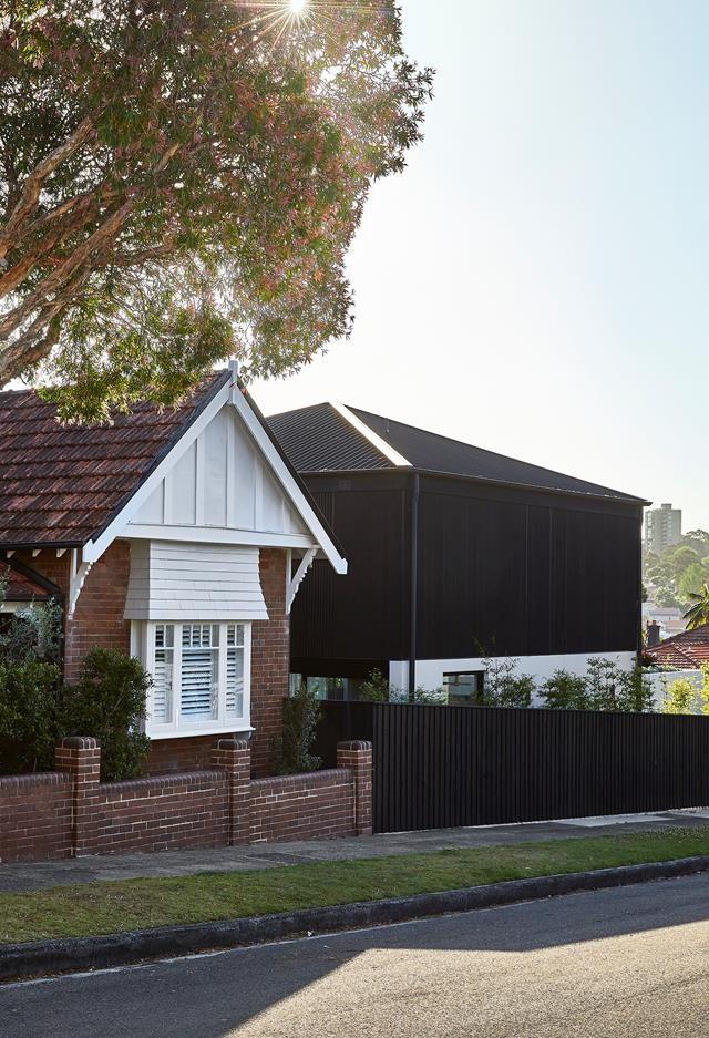 The extension of [this Federation-style home](https://www.homestolove.com.au/federation-homes-modern-extension-22361|target="_blank") in Sydney was a "complement by contrast" approach, explains architect Daniel Boddam of Daniel Boddam Studio, whereby the expressions of the traditional house are counterbalanced by the drama of the blackened and minimalist rear addition.