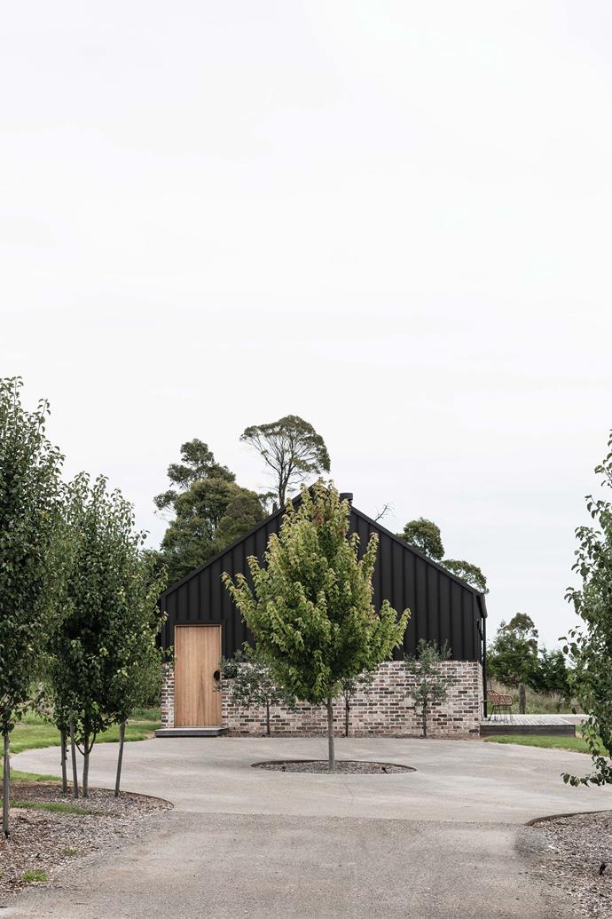 Clad in a moody Colorbond shade and paired with recycled bricks, [this boutique accommodation](https://www.homestolove.com.au/the-barn-at-rangeview-country-accommodation-23464|target="_blank") in the South Highlands embraces the beauty of combing the old and the new. 