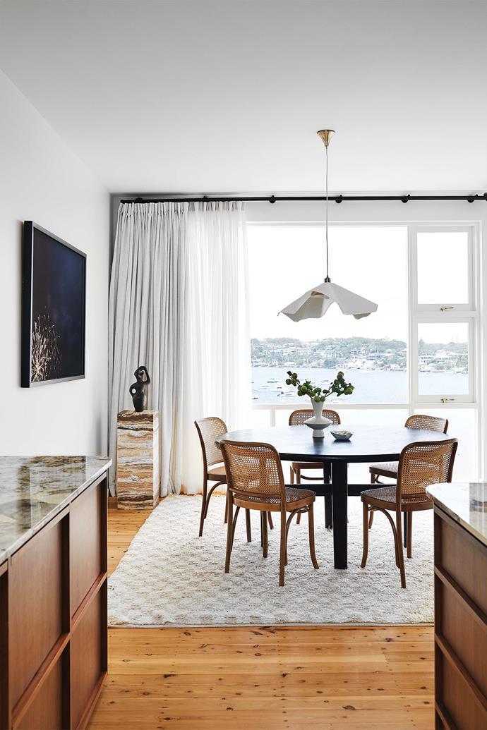 Pulling back the curtains from [Tuiss Blinds Online](https://www.blindsonline.com.au/|target="_blank"|rel="nofollow") presents the family with a magnificent view. Dining table, [Living By Design](https://livingbydesign.net.au/|target="_blank"|rel="nofollow"). Chairs, [Thonet](https://thonet.com.au/|target="_blank"|rel="nofollow"). Pendant light, Zara Home UK. Travertine onyx plinth by Kerrie-Ann. Sculpture by Tina Psarianos. Framed artwork by [Alicia Taylor](http://www.aliciataylorphotography.com/|target="_blank"|rel="nofollow").