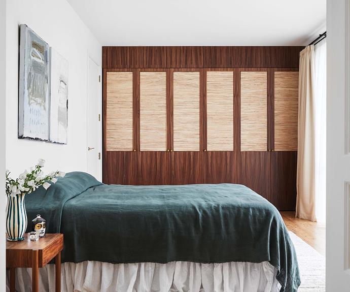 As in the home office, Kerrie-Ann and [Refined Joinery](https://www.refinedjoinery.com.au/|target="_blank"|rel="nofollow") collaborated on the wardrobe doors. Side table, Curious Grace. Linen bedcover, [In Bed Store](https://inbedstore.com/|target="_blank"|rel="nofollow"). Valance, found on Etsy. Lido pinch vase, [Alex & Trahanas](https://alexandtrahanas.com/|target="_blank"|rel="nofollow"). Dandelion cube, [The DEA Store](https://thedeastore.com/|target="_blank"|rel="nofollow"). Fornasetti candle, [Mecca](https://www.mecca.com.au/|target="_blank"|rel="nofollow"). Artwork by [Sylvia McEwan](https://sylviamcewan.com/|target="_blank"|rel="nofollow").