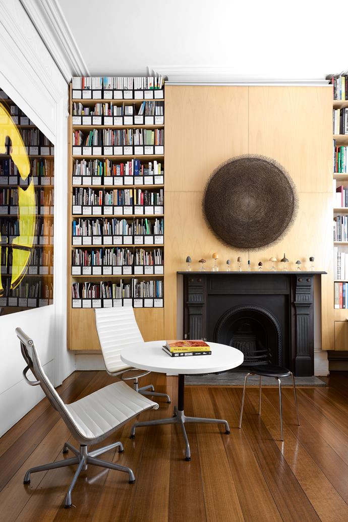 In Amanda's office, on the left is Eclipse (Playtime), 2013, Ultra Endura photograph by Isaac Julien. Above the fireplace is a copper wire sculpture, Swarm, 1998, by Bronwyn Oliver, and on the mantelpiece is Untitled – Snake Oil, 1998, a 12-piece work by Hany Armanious. Eames chairs and side table from Living Edge.
