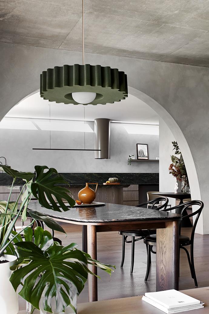 Samantha installed pendant lights from her own 'Opera' range throughout the home, with a ribbed profile emitting an ambient glow while diffusing and absorbing noise.
