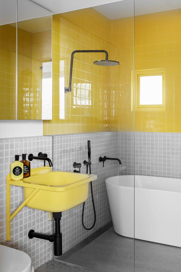 Yellow was used in the children's bathroom to provide a playful element that wouldn't date too quickly, or feel too childish as the kids get older. The yellow sink is from 3Monkeez and is an ordinary wall-mounted sink, which Nikita had powder-coated to match the bathroom.