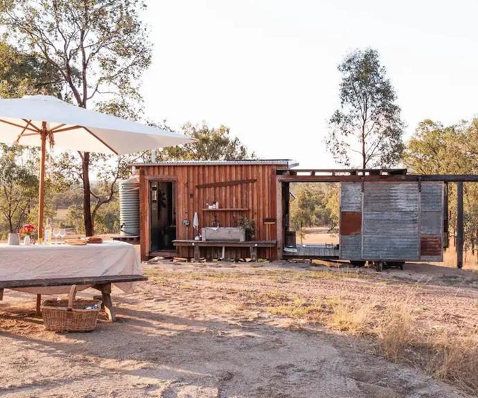 **Bloodwood Cabin, Rawbelle**<br>
Built with intent to help guests disconnect from Wi-Fi and instead connect with nature, Bloodwood Cabin has everything you need and nothing you don't. Fully-sustainable and located on 20,000 acres which is home to organic beef cattle, we can't think of a better place to recharge – furry friend in tow!<br>
To book, visit **[Bloodwood Cabin](https://www.airbnb.com.au/rooms/49777225|target="_blank"|rel="nofollow")**.