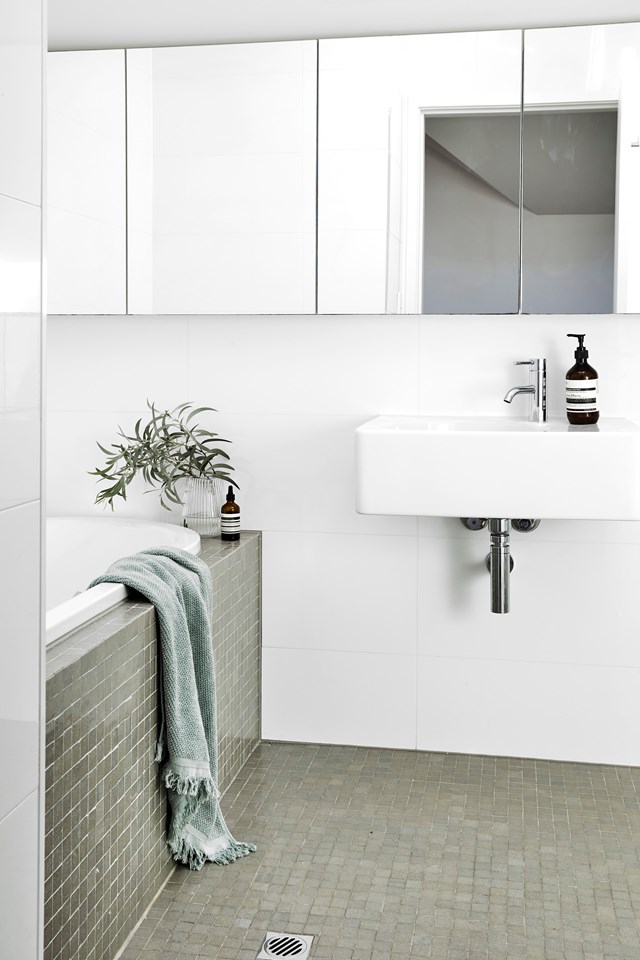 Wall-hung cabinetry and basin units provide ample storage but don't take up too much bathroom real estate. Bonus points if you can source on 'off the shelf' from a bathroomware supplier. The layout of [this bathroom](https://www.homestolove.com.au/art-deco-federation-home-lower-north-shore-23583|target="_blank") along with the mosaics on walls and floor, was unchanged in the renovations.